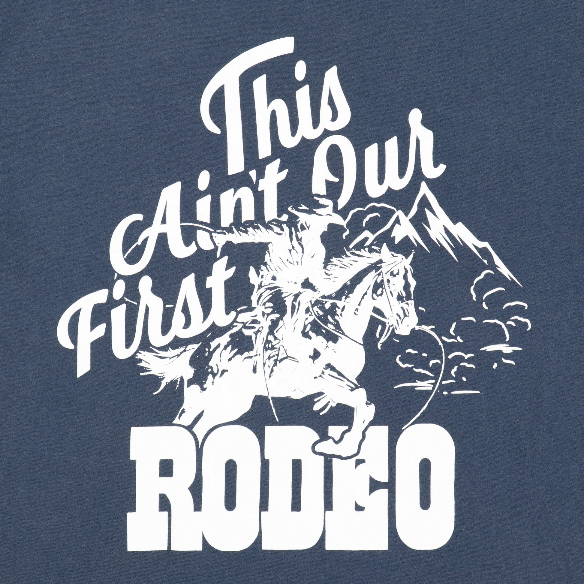 Close up of back logo "Ain't Our First Rodeo" T-Shirt